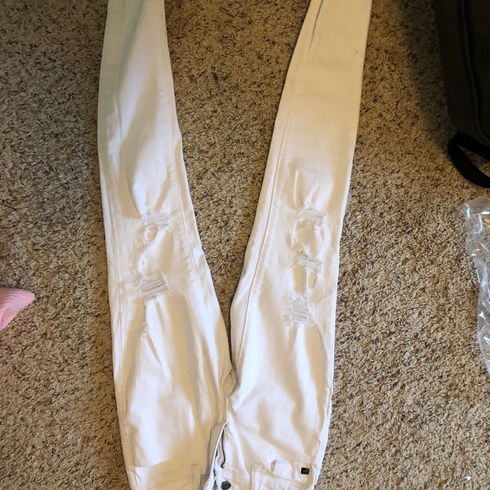 White ripped jeans